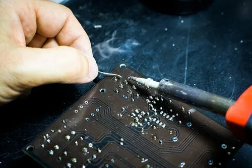 Technician servicing IT equipment